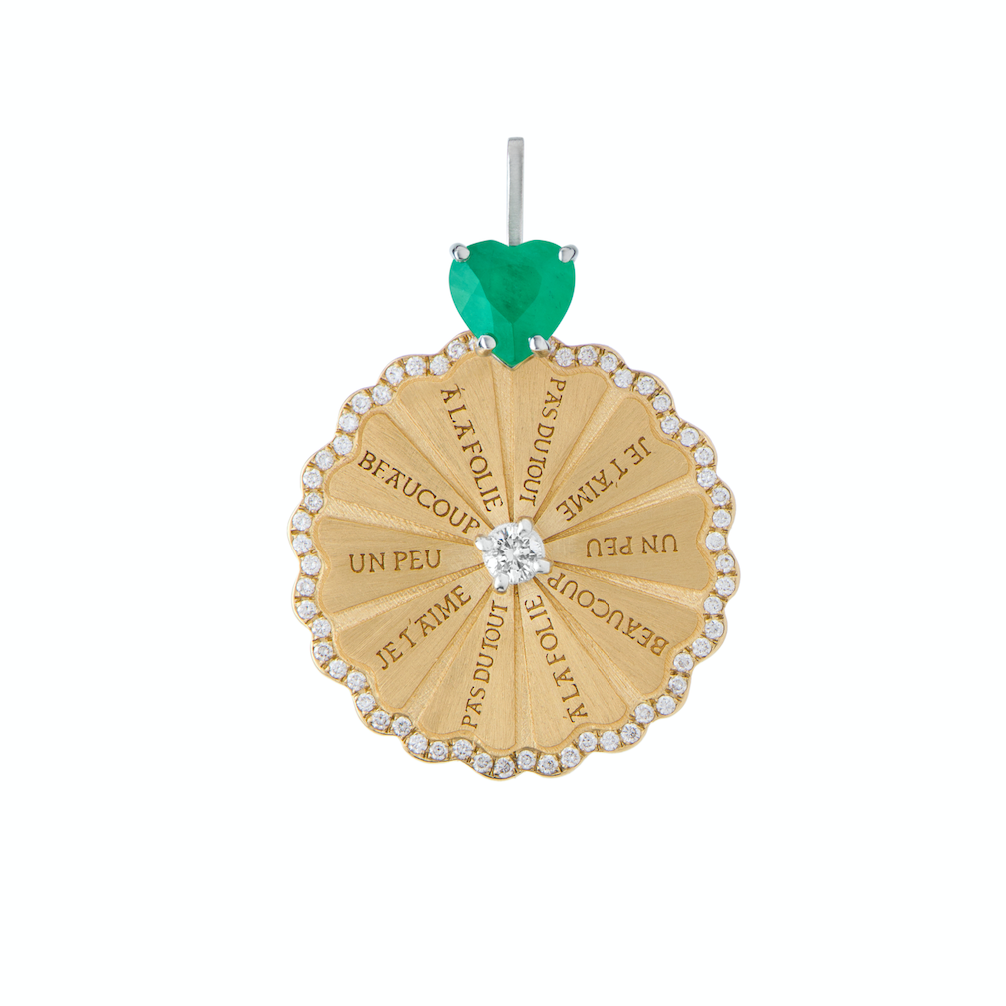 Spinning Marguerite Pendant with Emerald Heart