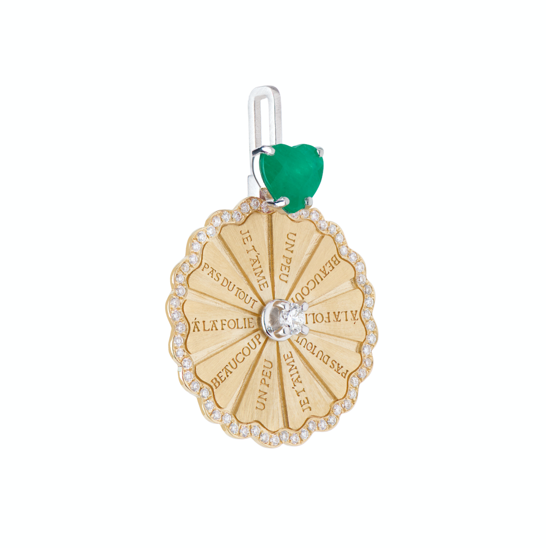 Spinning Marguerite Pendant with Emerald Heart